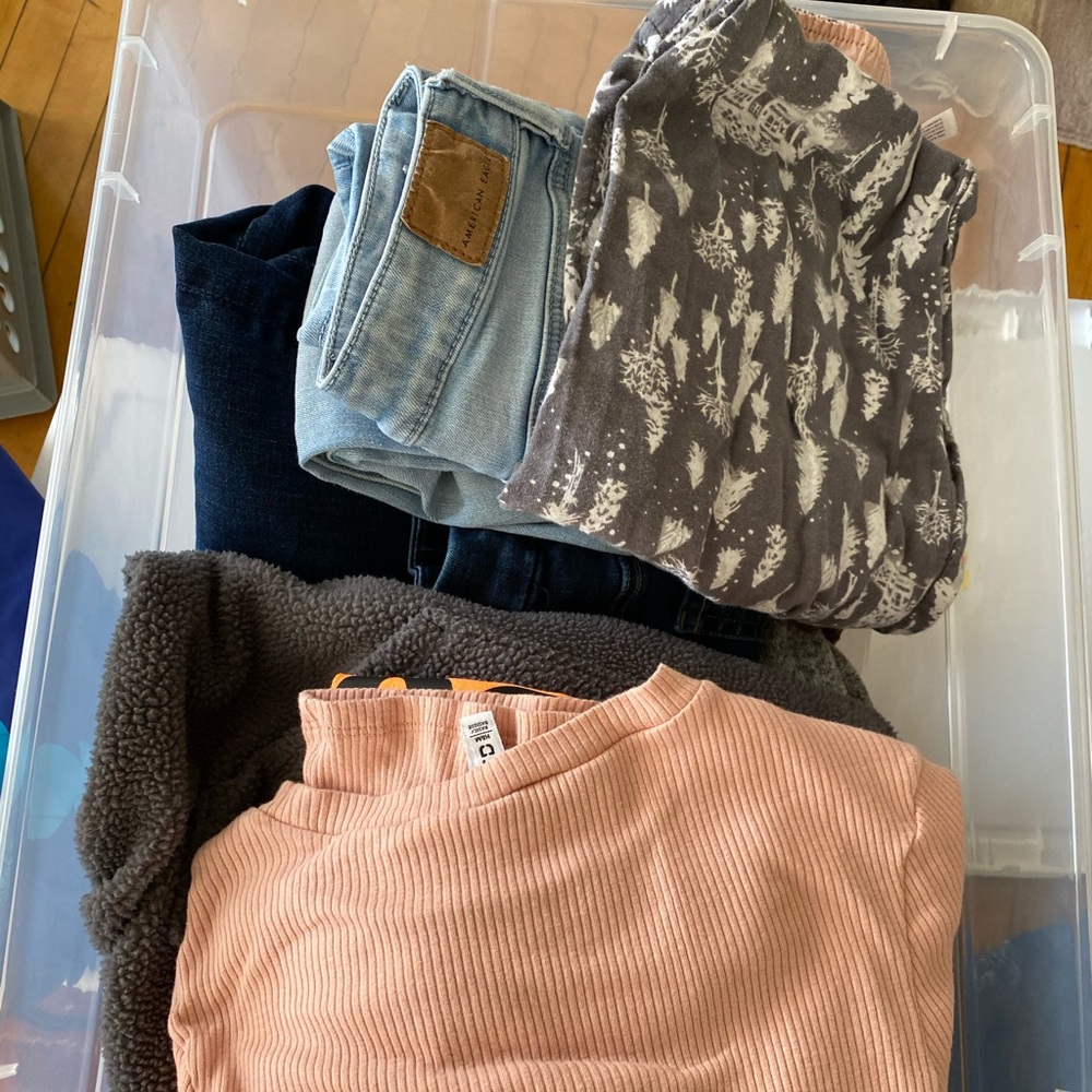 Large storage bin of assorted women’s/juniors
